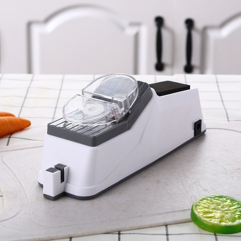 Affûteur de couteaux électrique RapidSharp blanc avec accessoires sur plan de travail cuisine