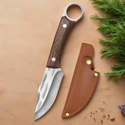 Le couteau cuisine avec étui brun
