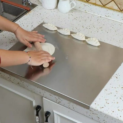 Planche a decouper acier inoxydable pour ravioli
